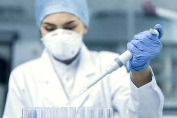 The scientist experimented in the laboratory