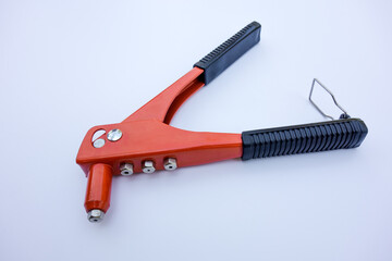 Tool for riveting rivets on white isolate
