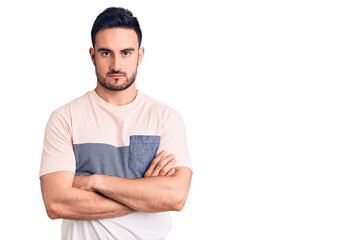 Young handsome man wearing casual clothes skeptic and nervous, disapproving expression on face with...