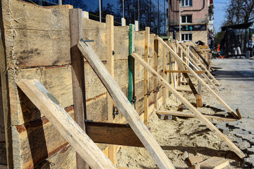 Wooden formwork is being prepared for pouring concrete. Construction.