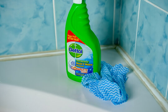 Norwich, Norfolk, UK &ndash; November 28 2020. An illustrative editorial photo of a bottle of Dettol mould remover on a white bath tub