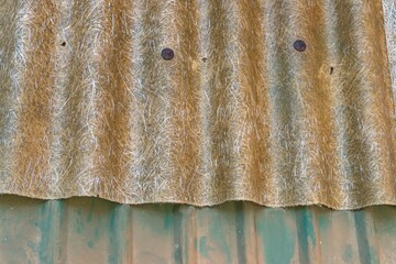 old fiberglass and metal corrugated roofing