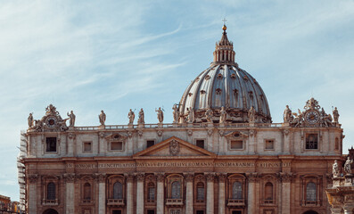 Fototapeta na wymiar St. Peter's Basilica on St. Peter's square in Vatican, Rome, Italy.
