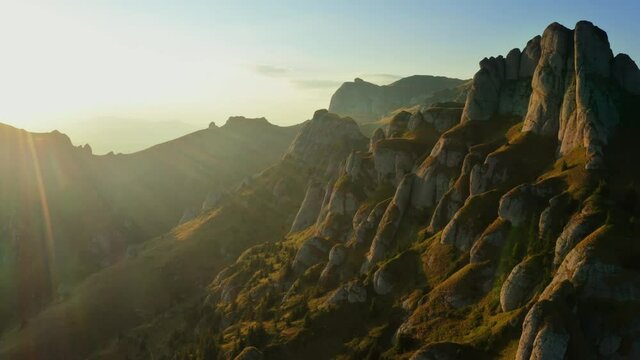 Drone view over Ciucas Peak at sunset, beautiful mountain scenery in Romania