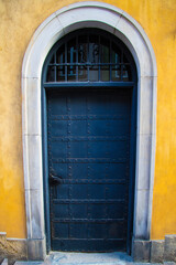 Old entrance door to the building, background.