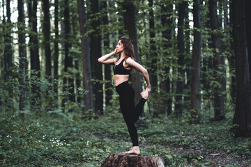 athletic girl running in the Park and doing exercises Jogging, health exercise