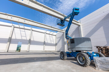 Warehouse construction site with industrial vehicle