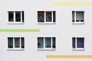 a fragment of the facade of an apartment building that has just been renovated