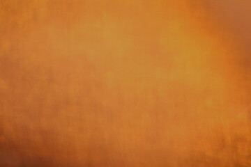 The glass is illuminated by the sun at sunset