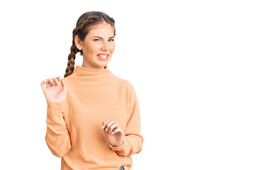 Beautiful caucasian woman with blonde hair wearing casual winter sweater disgusted expression,...