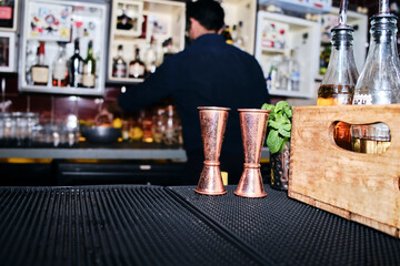 Barman preparing cocktails in the nightclub.