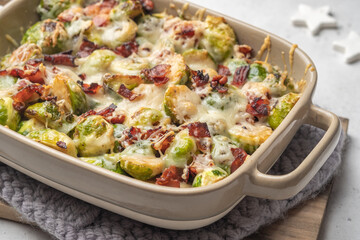 Fototapeta na wymiar Baked brussel sprout casserole with a bacon and cheese