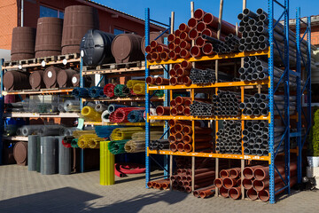 Sewage pipes of different diameters on the distribution center warehouse or DIY stores.