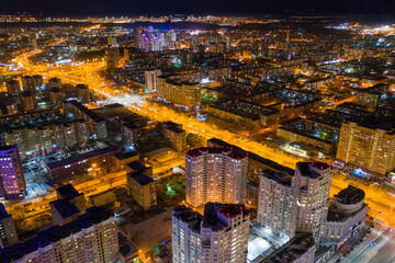 Top view of the night modern city. Bright lights of the night streets. Ekaterinburg. Russia