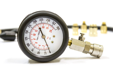 Close up of compression meter use for measure car cylinder compression on white background,...