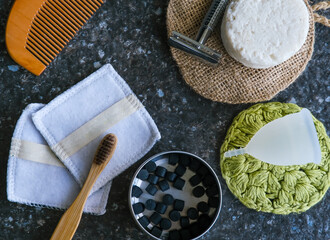 Eco cosmetic and bathroom accessories: bamboo toothbrush, solid toothpaste tablets, silicone...
