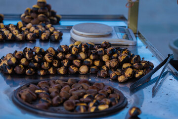 baked chestnuts, chestnuts standing on the counter
