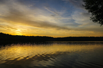 Sunset river water reflection landscape. River sunset reflection. Sunset river landscape. Sunset...