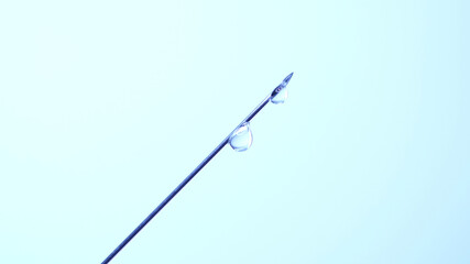 Vaccine dripping from sterile needle syringe. Concept of medical research development and production of vaccine against coronavirus, COVID 19. Drugs and medications for pharmaceutical industry.