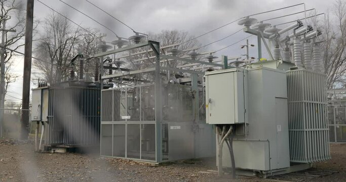 Electric power station through chain link fence