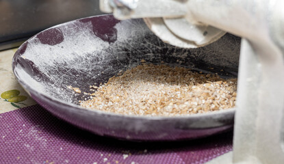 a plate with ground grain for brewing beer