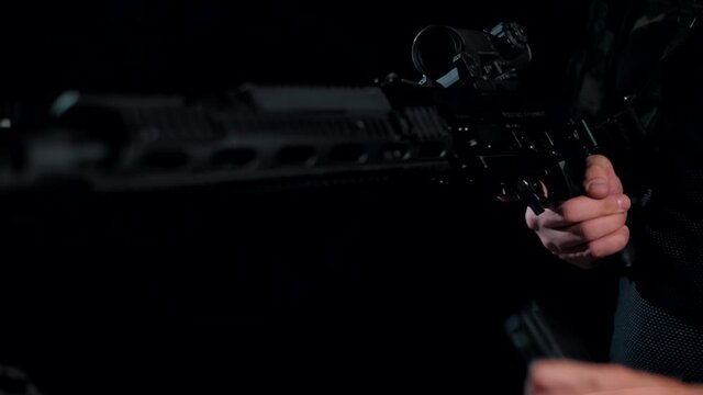 Modern Kalashnikov assault rifle is loaded with ammunition