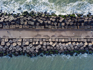 aerial view of a jetty at the entrance of the harbour of Scheveningen