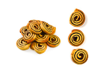 Baked cookies with raisins and poppy seeds isolated on white background.