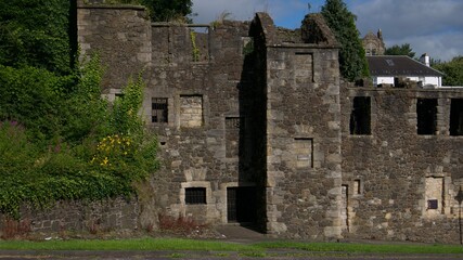 Fototapeta na wymiar Abandoned old merchant house, stone building in Stirling 