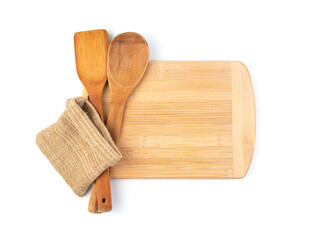 Culinary background with a cutting Board, wooden spatulas and a linen bag on a white background. Top view with space to copy. The concept of cooking.