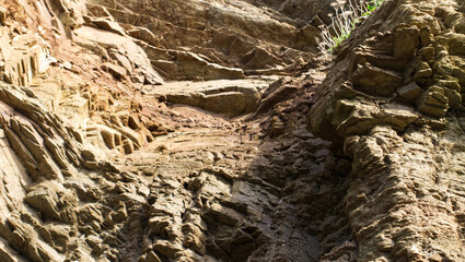 Patterns and backgrounds in the beach side rocks