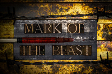 Mark Of The Beast text with syringe on textured grunge copper and vintage gold background