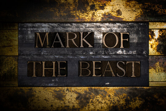 Mark Of The Beast text on textured grunge copper and vintage gold background