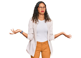 Young african american girl wearing business clothes clueless and confused with open arms, no idea...