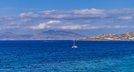 Panoramic view of sailing catamaran in Mykonos Town (Chora) on the island of Mykonos, Cyclades, Greece