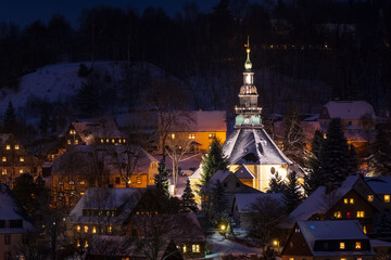 Illuminated Church in Seiffen at Christmastime. Saxony Germany - 396169014
