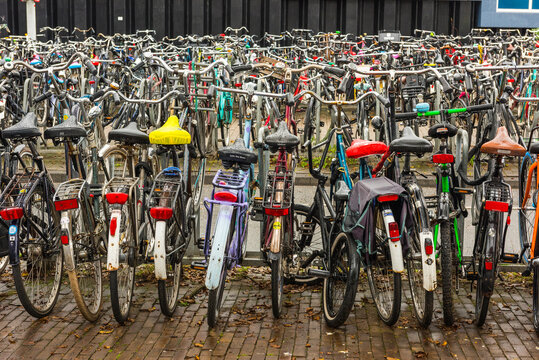 Parking of bicycles in Amsterdam , Netherlands.