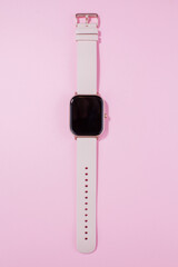 a women smart watch on pink background