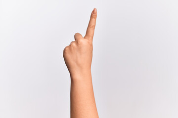 Hand of caucasian young woman counting number one using index finger, showing idea and understanding