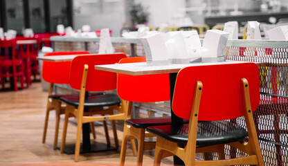Cafeteria or canteen interior. School cafeteria. Factory canteen with chairs and tables, nobody. Modern cafeteria interior. Clean canteen in modern school. Lunch room.