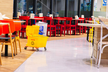 Cafeteria or canteen interior. School cafeteria. Factory canteen with chairs and tables, nobody. Modern cafeteria interior. Clean canteen in modern school. Lunch room.