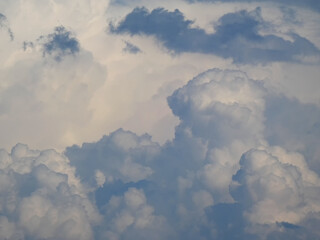 Naklejka na ściany i meble Dramatic sky with large Cumulus thunderstorm dark clouds.