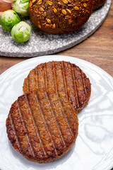 Grilled plant based, meat free vega burgers close up