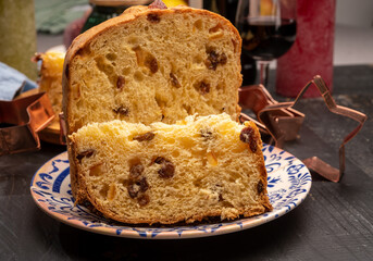 Christmas food, fresh Italian panettone cake made from yeast dough with dried fruits