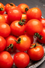 Small red ripe Sweet Enjoy cherry vine tomatoes, Rivolo variety