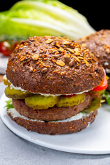 Grilled plant based, meat free vega burgers close up