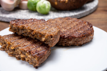 Grilled plant based, meat free vega burgers close up