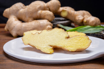 Fresh ginger rhizome root used in traditional medicines and for flavoring meals worldwide.