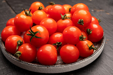 Small red ripe Sweet Enjoy cherry vine tomatoes, Rivolo variety