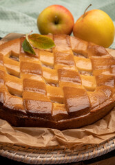 Fresh baked apple cake or pie, filled with sweet apples, raisins and cinnamon
